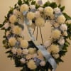Hydrangea, White Roses, White Carnations, Standard Mums, Babies Breath,  Wax Flower