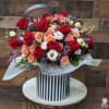 Charming Hat Box Full Of Flowers