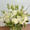 Immerse yourself in the epitome of luxury with this stunning all-white floral