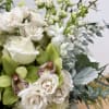 &quot;Marvel at this elegant floral arrangement, artfully arranged in a lavish crystal