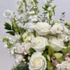&quot;Marvel at this elegant floral arrangement, artfully arranged in a lavish crystal