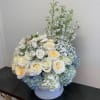 Order this beautiful and unique arrangement at Kenneth Village Flowers. We proudly