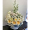 Order this beautiful and unique arrangement at Kenneth Village Flowers. We proudly