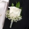 Our boutonnieres are custom designed in a wide range of flowers and