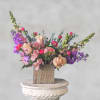 Introducing &#039;Spring Embrace&#039; &ndash; a stunning crescent-shaped flower arrangement designed to captivate