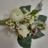 A classic white boutonni&egrave;re that compliments any suit. A perfect addition for