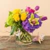 A vivid and lush design featuring vibrant pink and yellow roses, purple