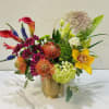 Golden Pop is a vibrant mix of colorful blooms in a sleek