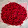 One hundred gorgeous long stem roses delicately wrapped in craft paper. Send