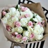 Fifty beautiful roses delicately wrapped in craft paper. Perfect gift for a