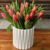Any  color tulips in ceramic vase