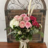 2 dozen roses in three different colors.