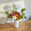 Petite yet full of happiness in a hobnail  or glass vase.