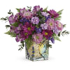 Pretty as a poem, this delicate purple bouquet is perfectly presented in