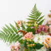 Peach Surprise design is made of all white and peach flowers. Perfect