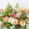 Peach Surprise design is made of all white and peach flowers. Perfect