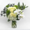 VASE OF MIXED WHITE FLOWERS WITH ORCHIDS AND ROSES 

Abundant, Elegant, Beautiful.