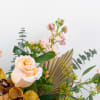 Cafe Au Lait design is made of all white and peach flowers.