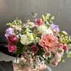 Sugar and Spice is a sweet arrangement with warm and delicious spring