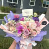 Mix flowers bouquet with white and lavender mood.
