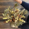 This arrangement is an array for beautiful dried flowers in a hanging