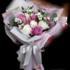 red, pink, purple, and white roses with filler and green