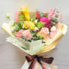 With bright, soft color tones, this bouquet is perfect for birthdays, anniversaries