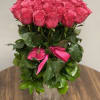 2 dozen stunning hot pink Roses in a silver container.
Deluxe price is