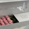 Pink roses in a box 