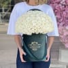 50 white roses in our signature velvet green  box