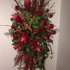 A very elegant and modern spray of all red flowers including many
