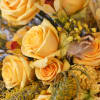 A cheerful yellow golden hand tie bouquet with feather garden brighten up