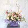 A charming handtie Bouquet create with 2 dozen different shade of blush