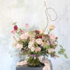 A charming handtie Bouquet create with 2 dozen different shade of blush