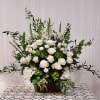 A beautiful tribute of classic white blooms.  Elegant roses, hydrangeas, snapdragons