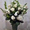 A beautiful tribute of classic white blooms.  Elegant roses, hydrangeas, snapdragons