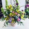 Gorgeous Cymbidium orchids are the stars in this stunning arrangement!