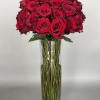 50 long stem roses. 
Size of design 35 inches tall.
