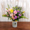 Cute keepsake graduation vase with spring blooms!