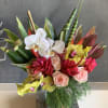 This arrangement brings the beauty of the tropics to life!