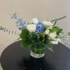 Roses and Hydrangeas in a glass vase
