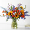Feel the love from every direction with these beautiful sunflowers, roses, and