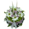 Celebrate a birthday with a delightful &quot;Blooming Birthday Cake&quot; floral arrangement adorned