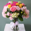 Pink hydrangea, roses and mini green hydrangea arranged in an absolutely delightful