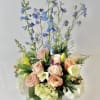 This refreshing bouquet includes delphiniums, lilies, spray roses and hydrangeas. Like a