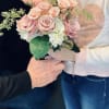 Pretty little bouquet. Hydrangea, spray roses. Pictured in light Pink and White.