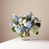 Experience a modern and unique floral arrangement that beautifully blends the sentiments