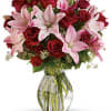 Lovely reds and pinks come together in this lavishly romantic anniversary gift.