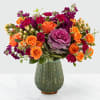 Celebrate the season with a fresh take on traditional harvest arrangements. Comprised