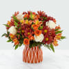 Our handcrafted Shades of Autumn Bouquet is designed to bring the comfort